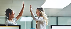 Awards two women high five